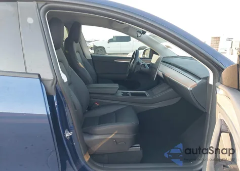 2024 Tesla Model Y from USA, damaged, VIN 7SAYGDEE7RA239148